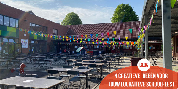 Schoolfeest met drukte op een versierde speelplaats